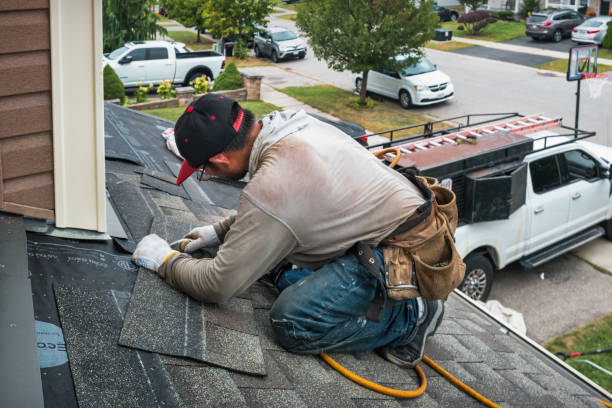 Professional Roof Replacement technician working in Paupack, PA